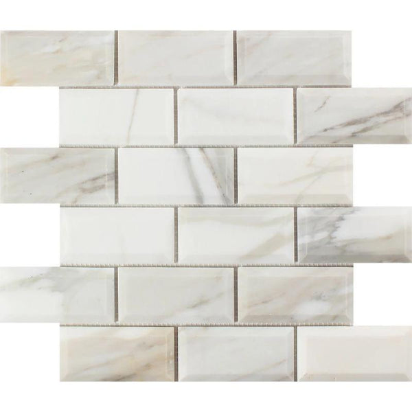Calacatta Gold Marble 2x4 Deep Beveled Polished Mosaic Tile.